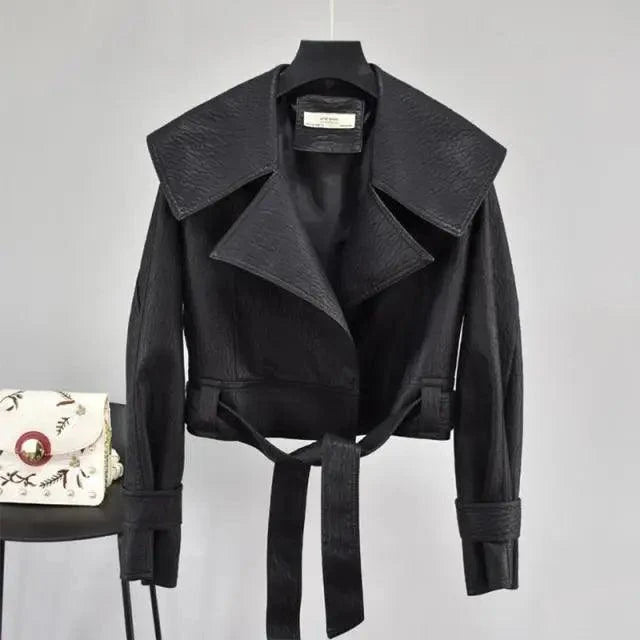 Stevvex black PU leather motorcycle jacket with cropped length, oversized lapels and waist belt on Tampa Home & Garden Store