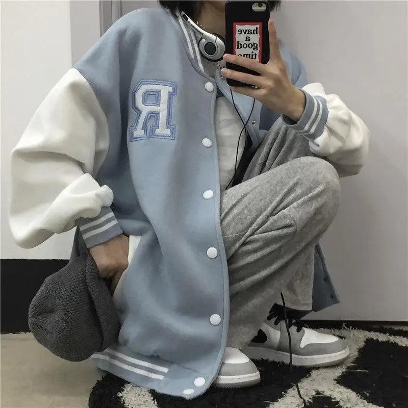 Stevvex bomber jacket light blue with white sleeves, R patch, snap front on Tampa Home & Garden Store