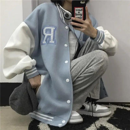 Stevvex bomber jacket light blue with white sleeves, R patch, snap front on Tampa Home & Garden Store