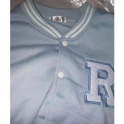 Bomber jacket Stevvex in light blue with rib collar, snap buttons, large white R patch on Tampa Home & Garden Store