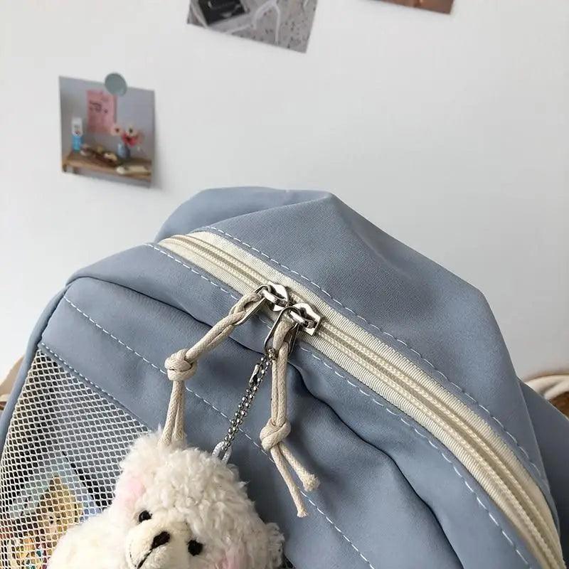 Stevvex waterproof backpack light blue with cream zipper and plush teddy keychain on Tampa Home & Garden Store