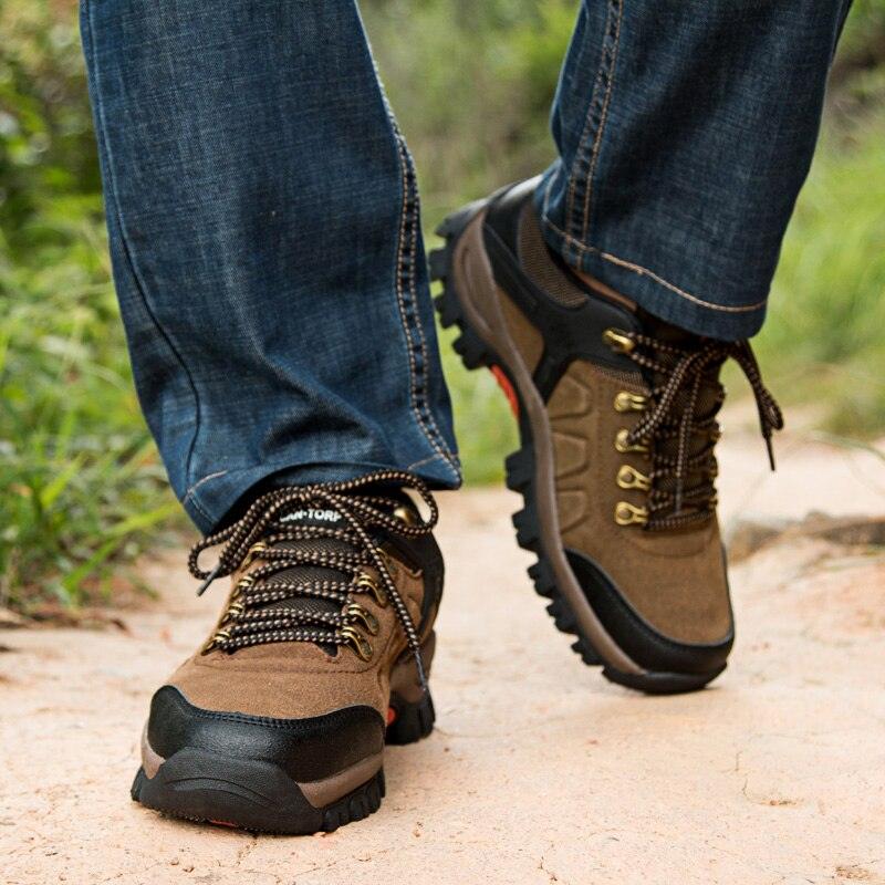 Stevvex men's brown waterproof hiking boots with rugged outsole on dirt trail on Tampa Home & Garden Store