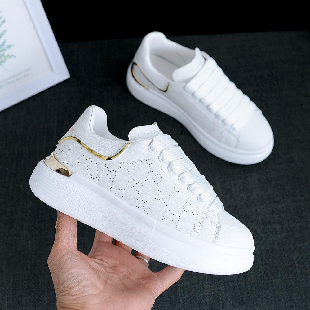 Stevvex white sneakers with thick sole, gold heel accents, lace-up casual trainers pair on Tampa Home & Garden Store