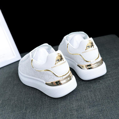 Stevvex white sneakers pair featuring a gold metallic heel band and thick platform sole on Tampa Home & Garden Store