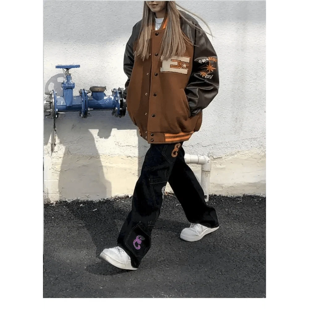 Stevvex varsity jacket brown body, black sleeves, patchwork bone embroidery, unisex streetwear on Tampa Home & Garden Store