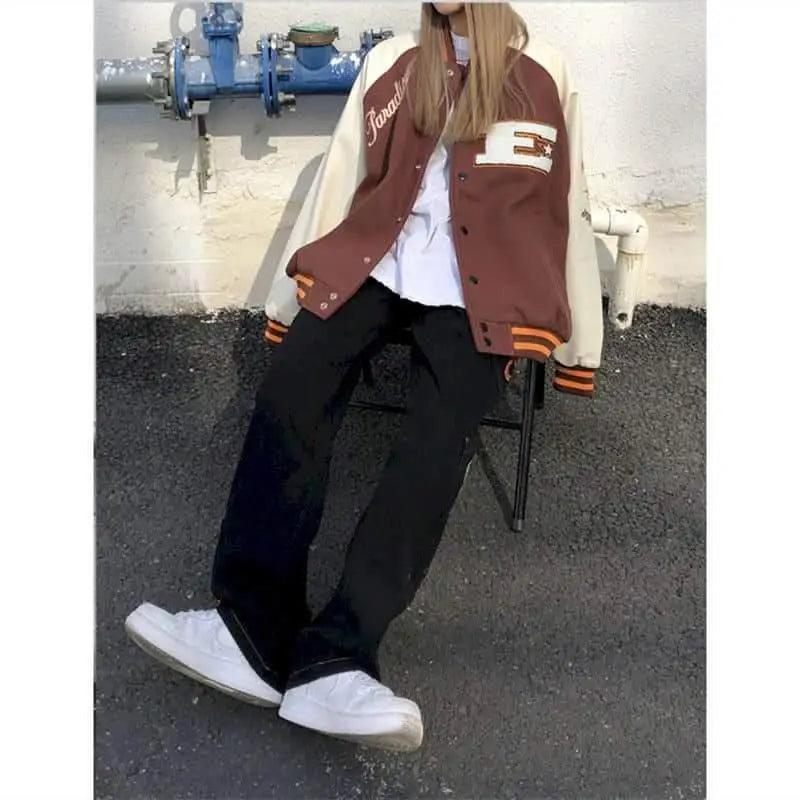 Stevvex varsity jacket ST93311JKL brown body cream sleeves orange cuff E patch worn by model on Tampa Home & Garden Store