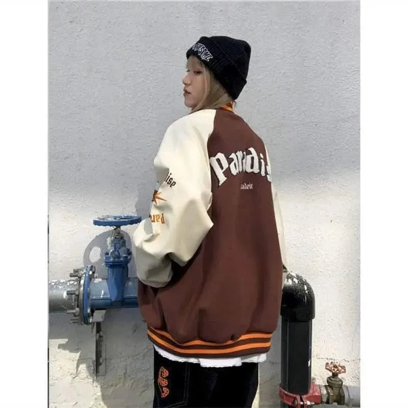 Stevvex varsity jacket color-block brown and cream with orange trim worn by model on Tampa Home & Garden Store