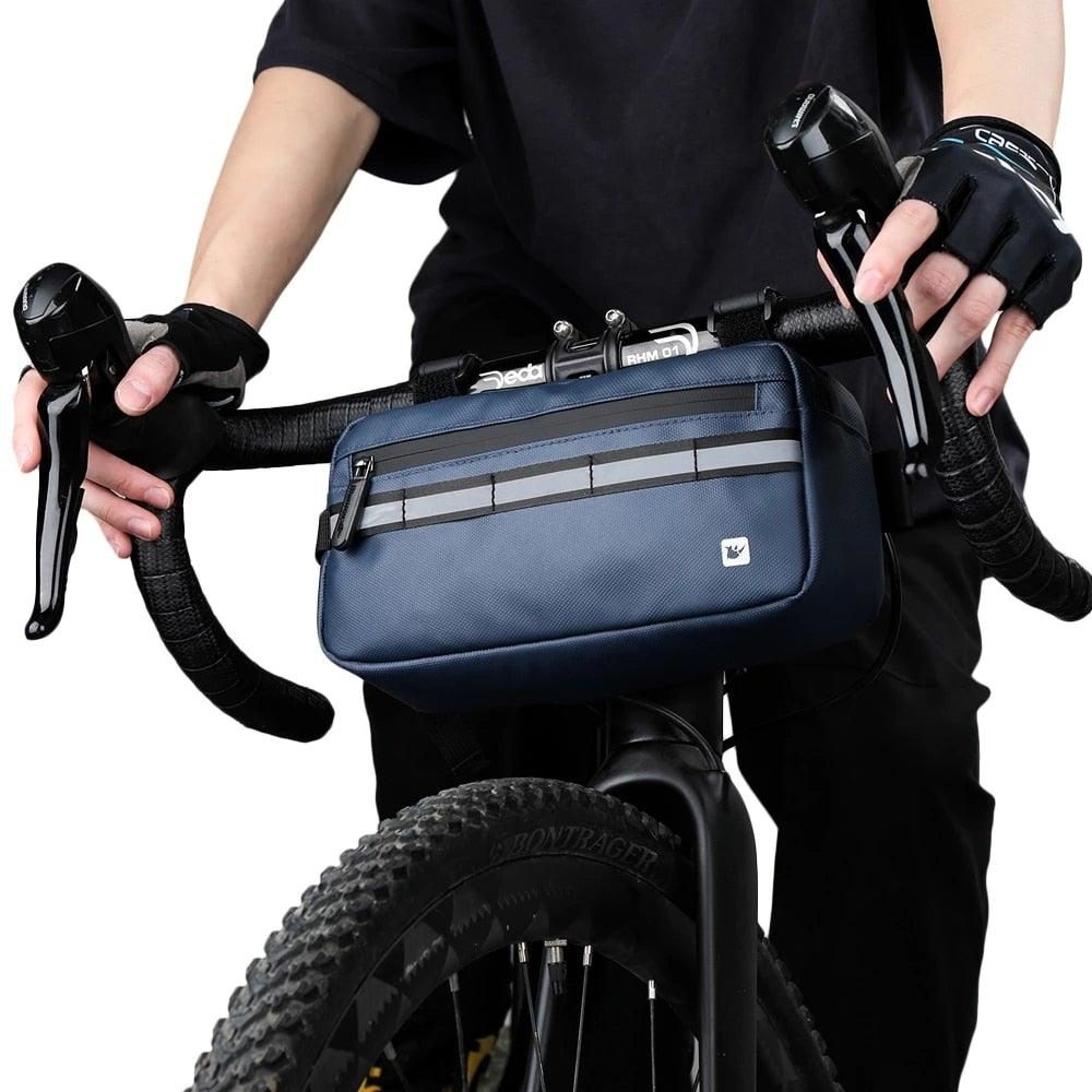Waterproof handlebar bag Stevvex navy blue with reflective stripe, mounted on bicycle on Tampa Home & Garden Store