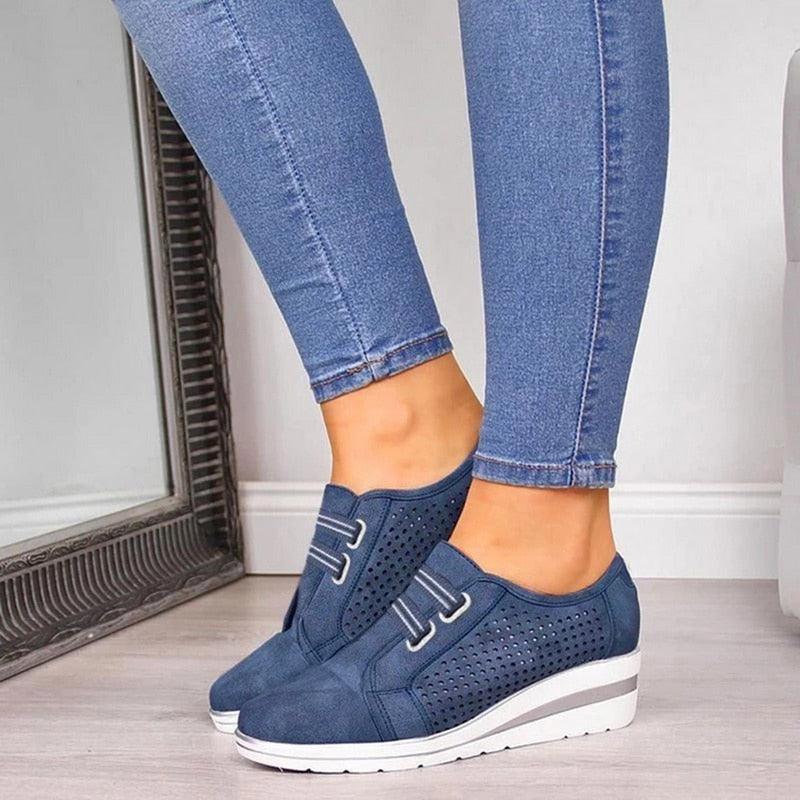 Stevvex blue sneakers with perforated side panels and white wedge sole on Tampa Home & Garden Store