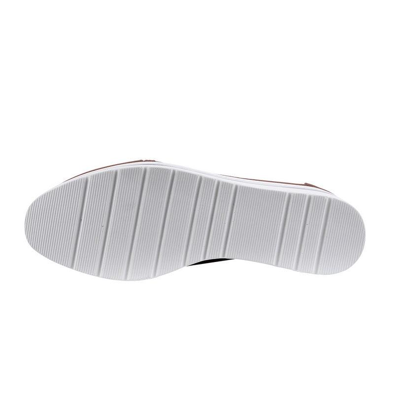 Stevvex women's sneakers outsole with white rubber sole and vertical grooves on Tampa Home & Garden Store
