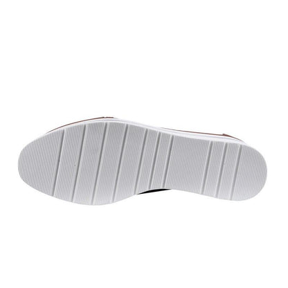 Stevvex women's sneakers outsole with white rubber sole and vertical grooves on Tampa Home & Garden Store