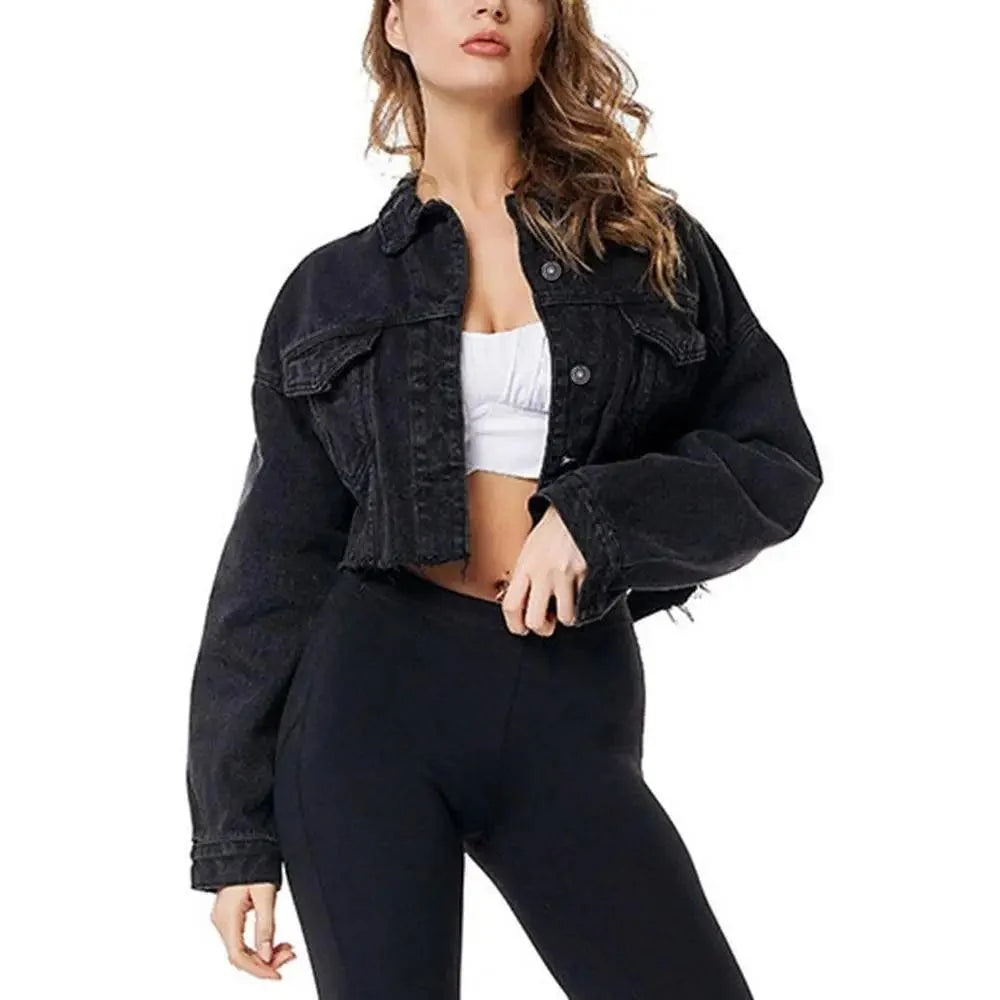 Cropped black denim trucker jacket with frayed hem and puff sleeves over white crop top on Tampa Home & Garden Store