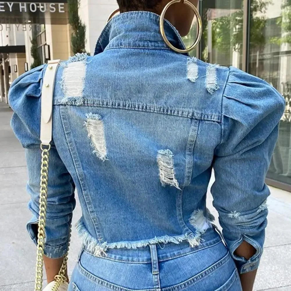 Ripped blue denim trucker jacket by Stevvex with distressed patches and puff sleeves on Tampa Home & Garden Store