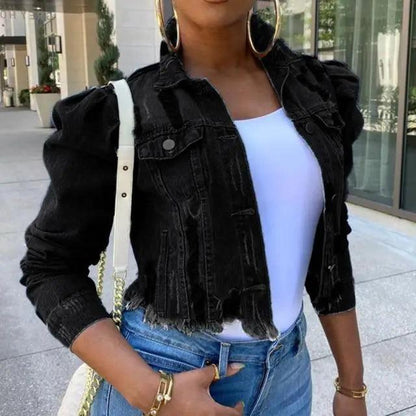 Stevvex cropped black ripped denim trucker jacket with puff sleeves over white tee and blue jeans on Tampa Home & Garden Store