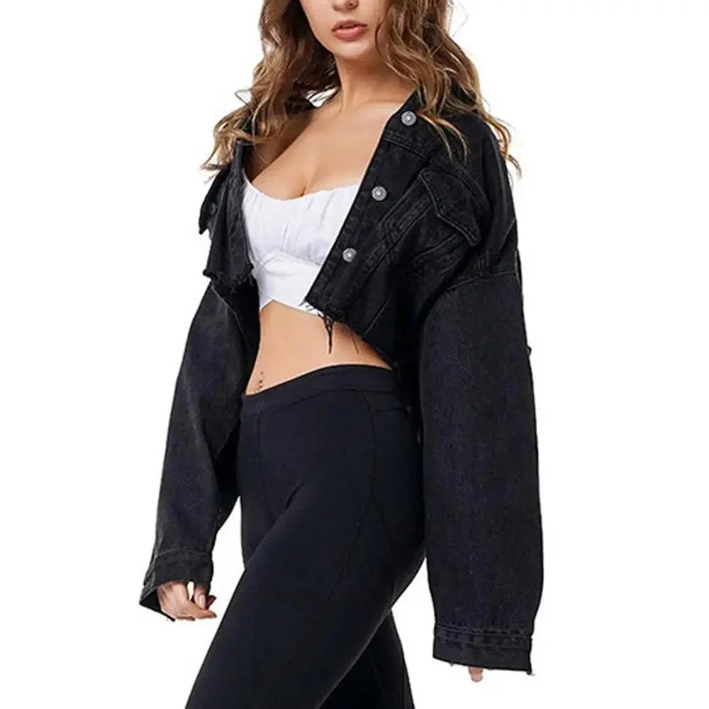 Stevvex black cropped ripped denim trucker jacket with puff sleeves worn over white crop top on Tampa Home & Garden Store