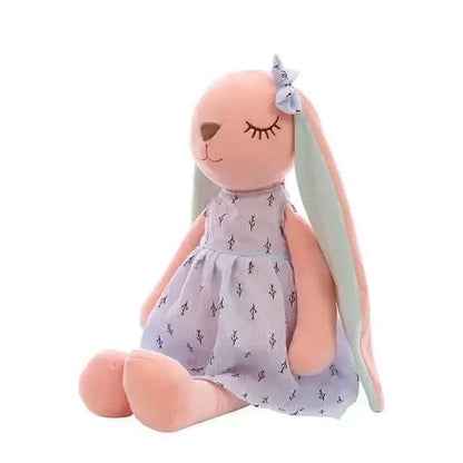 Stuffed bunny plush toy for infants in lavender dress with long pastel ears and bow on Tampa Home & Garden Store