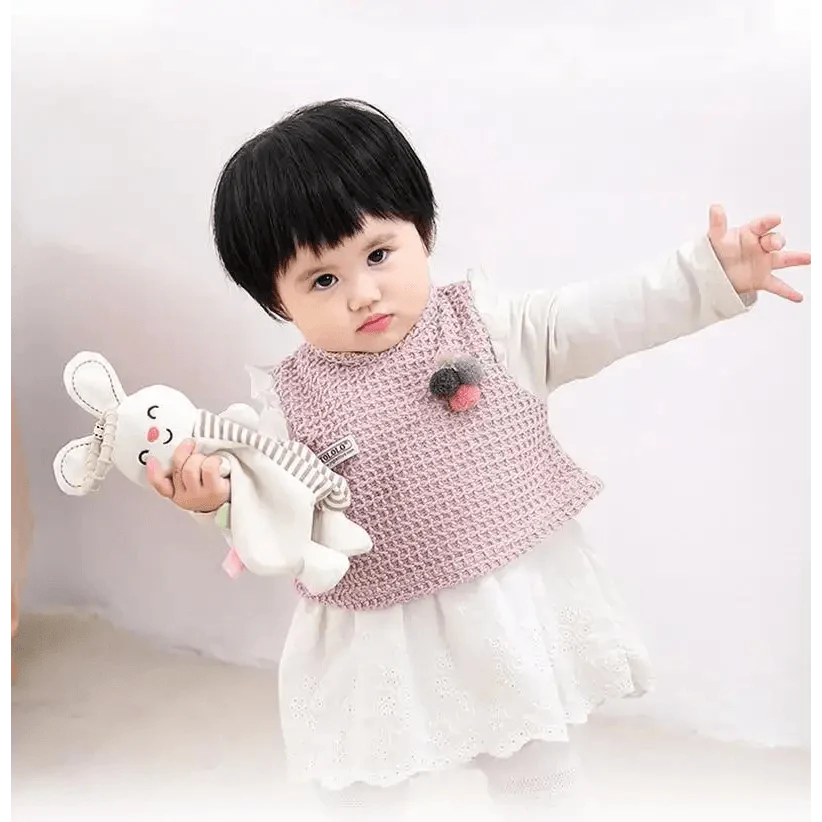 Stuffed rabbit plush toy for babies, soft white with striped body, held by toddler on Tampa Home & Garden Store