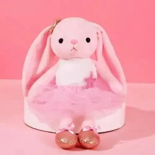 Pink plush bunny stuffed toy with tutu and brown shoes, seated on a white base on Tampa Home & Garden Store