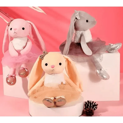 Three Stevvex bunny plush toys in peach, pink and gray with bows and tutu for infants on Tampa Home & Garden Store