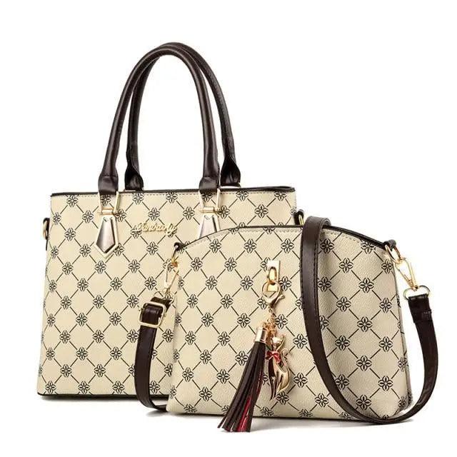 Stevvex two-piece beige leather shoulder bag set with dark brown handles and tassel charms on Tampa Home & Garden Store