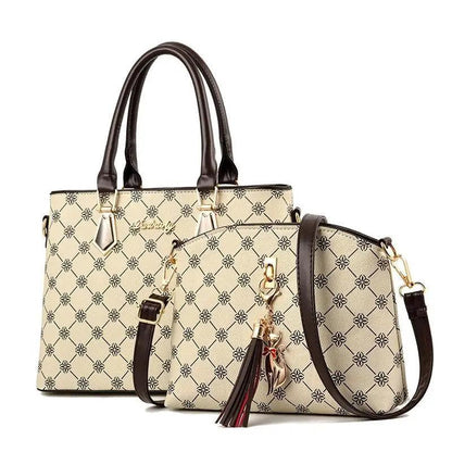 Two-piece beige leather shoulder bag set by Stevvex with dark brown handles and crossbody strap on Tampa Home & Garden Store