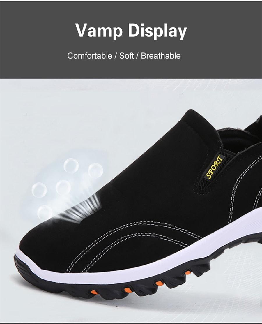 Stevvex men's black slip-on sneakers with white midsole and orange traction accents on Tampa Home & Garden Store