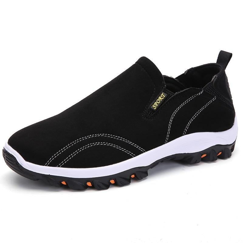 Stevvex men's slip-on sport sneakers, black upper, white sole, orange-outsole accents on Tampa Home & Garden Store