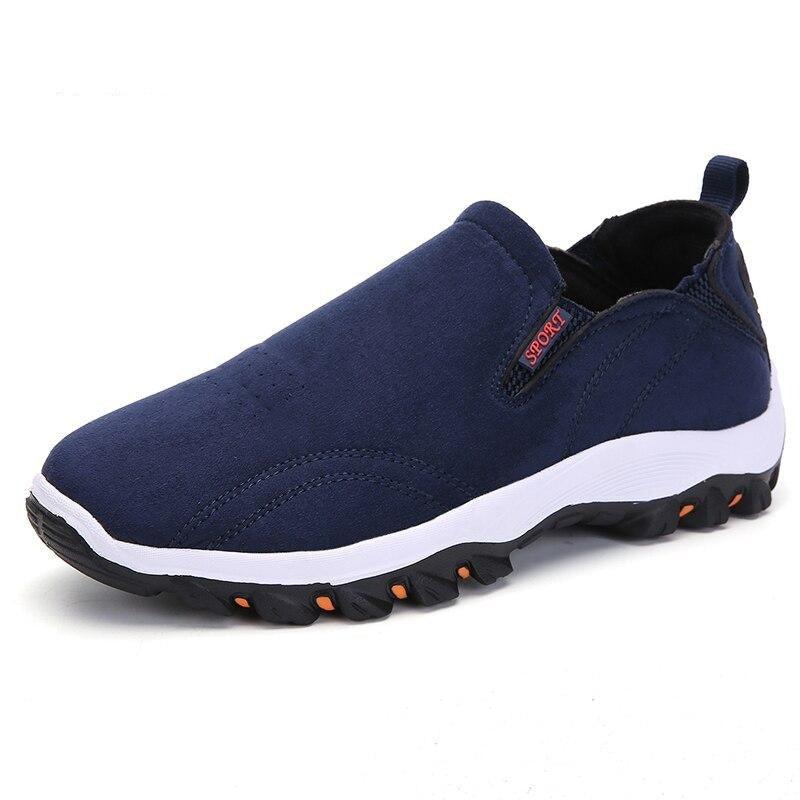 Stevvex navy blue slip-on sneakers with white sole and rugged outsole on Tampa Home & Garden Store