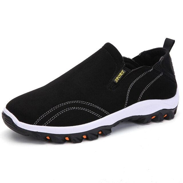 Stevvex black slip-on sneakers with breathable mesh upper and white sole accents on Tampa Home & Garden Store
