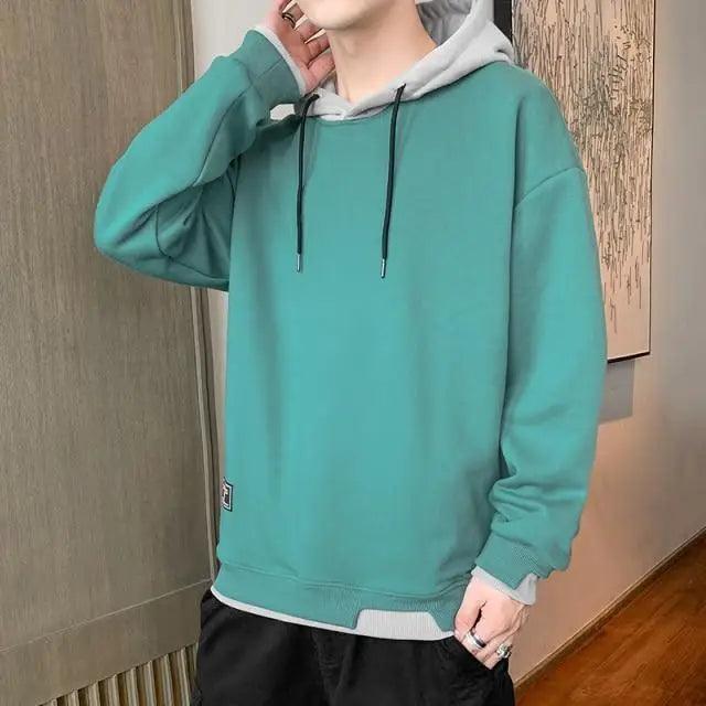 Stevvex men's teal solid-color pullover hoodie with gray hood lining and drawstrings on Tampa Home & Garden Store