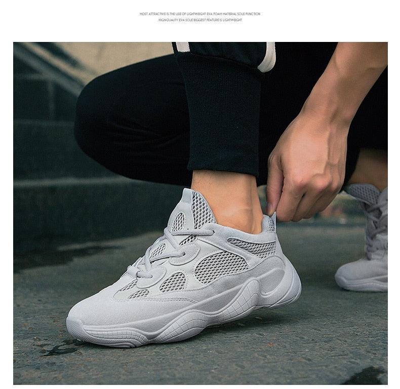 Men's breathable mesh sneakers pair in white/gray with a chunky sole on Tampa Home & Garden Store