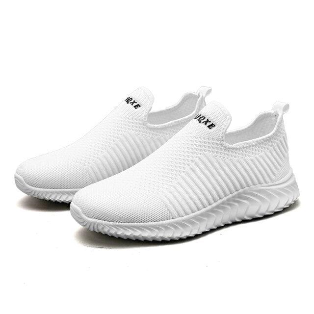 Stevvex white knit slip-on sneakers pair, breathable mesh upper, ridged outsole on Tampa Home & Garden Store