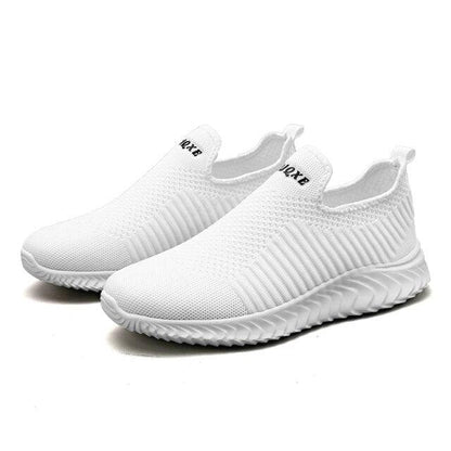Stevvex white knit slip-on sneakers pair, breathable mesh upper, ridged outsole on Tampa Home & Garden Store