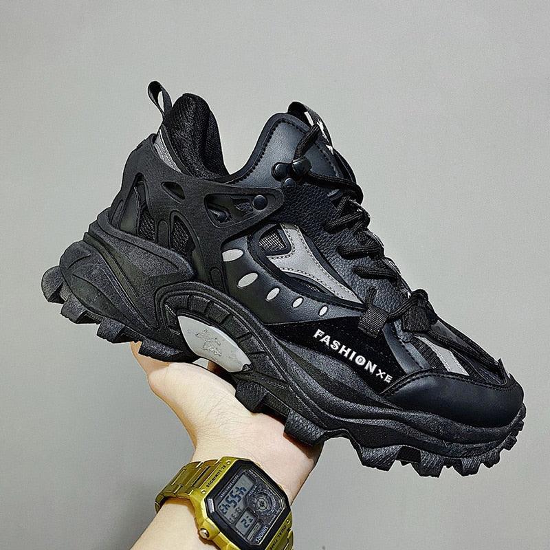 Stevvex men's black sneakers with thick rugged sole, breathable mesh and synthetic overlays on Tampa Home & Garden Store