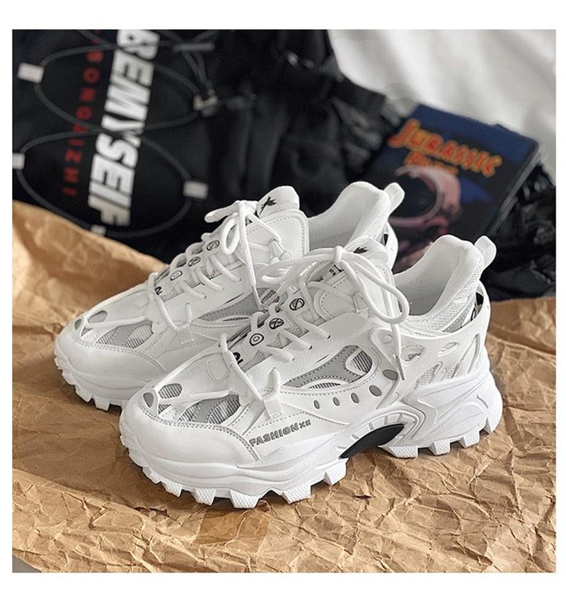 Stevvex men's white sneakers pair with breathable mesh panels and chunky sole on Tampa Home & Garden Store