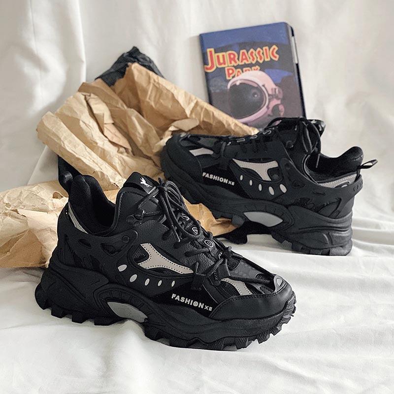 Stevvex men's black sneakers with chunky sole and grey overlays, pair displayed on Tampa Home & Garden Store
