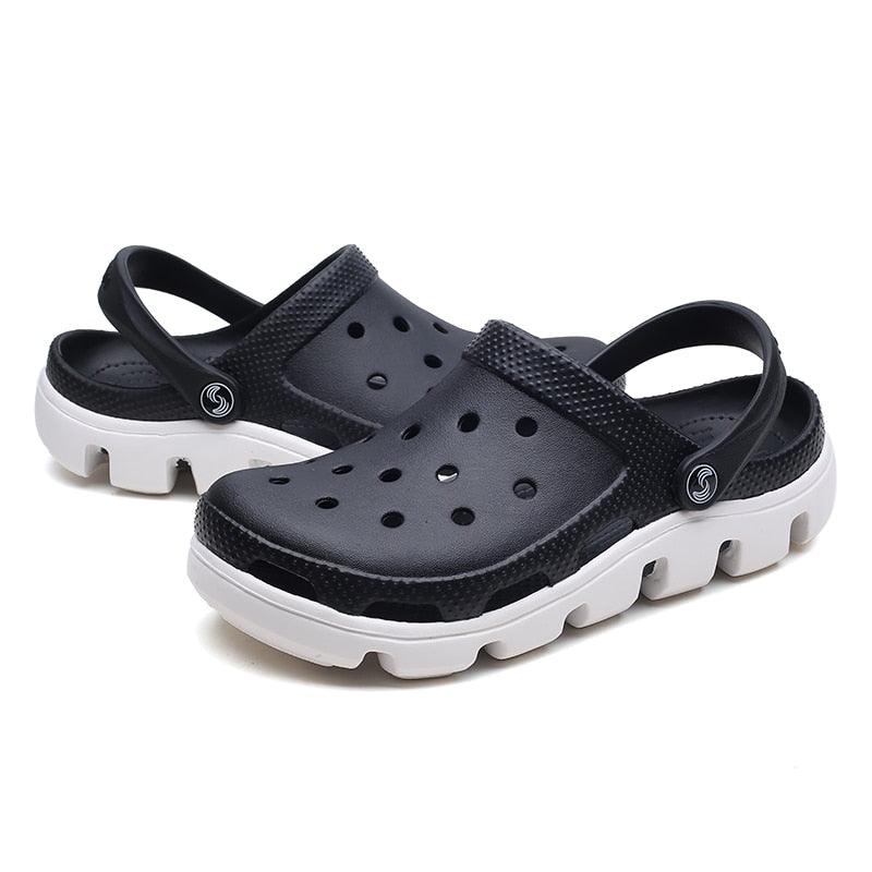 Stevvex men's black jelly sandals pair with adjustable heel strap and white chunky sole on Tampa Home & Garden Store