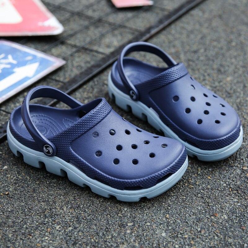 Stevvex two navy blue garden slippers with back strap and perforated holes, light sole on Tampa Home & Garden Store