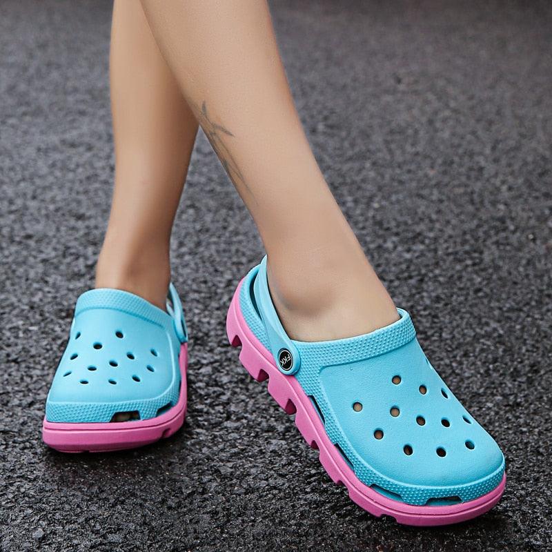 Men's Stevvex blue perforated slippers with pink sole pair on Tampa Home & Garden Store