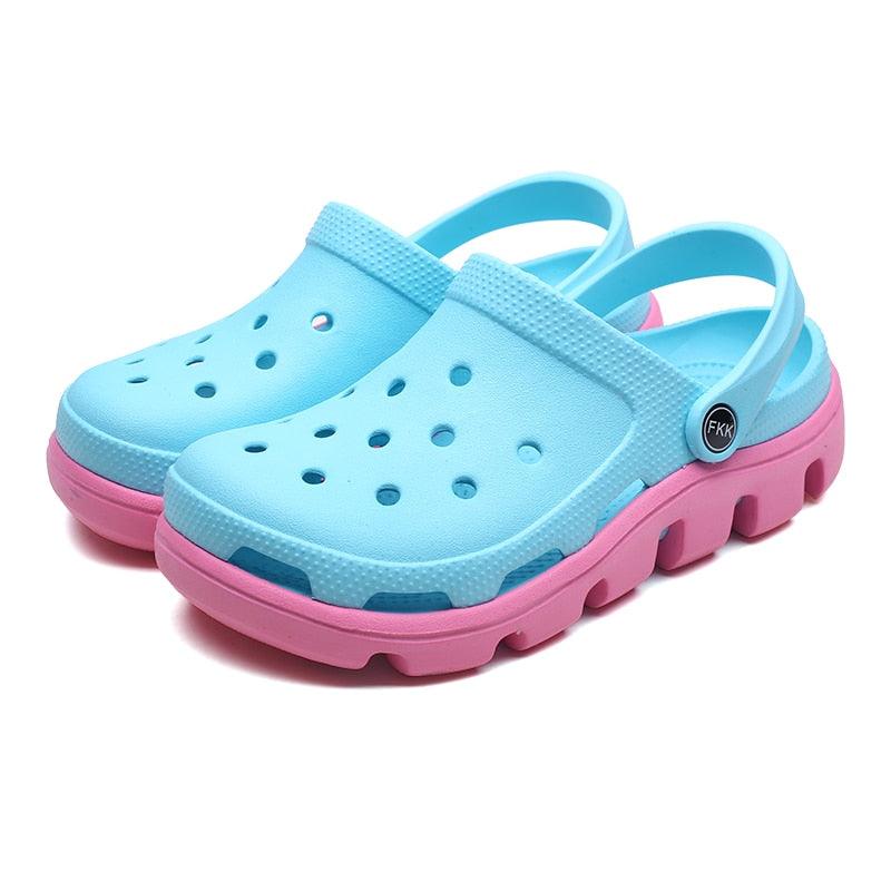 Stevvex men's blue slip-on slippers with pink sole, perforated upper and adjustable back strap on Tampa Home & Garden Store