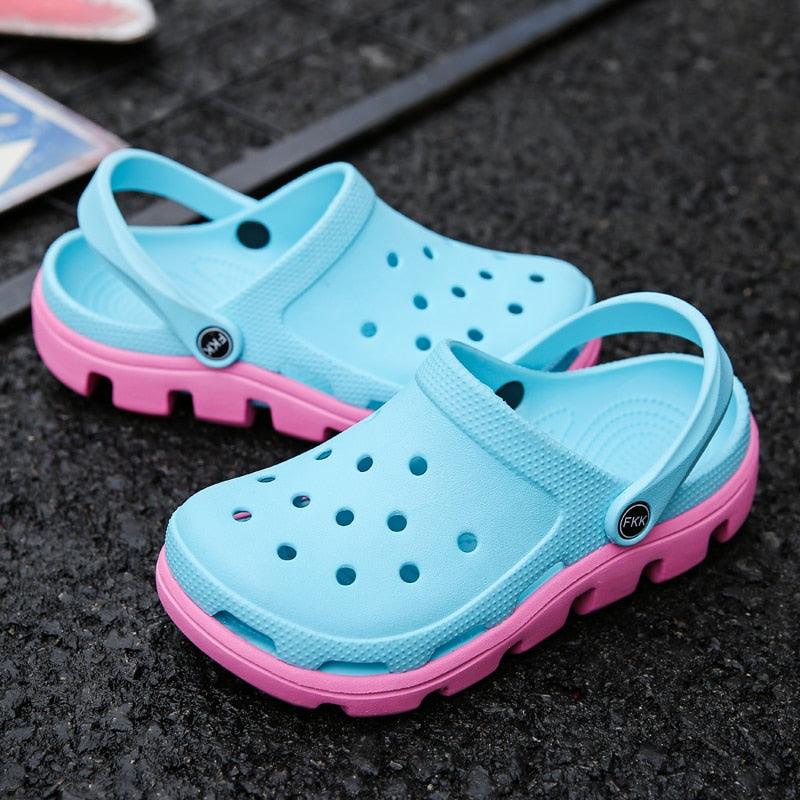 Stevvex blue men's slippers with pink sole, perforated upper, adjustable heel strap on Tampa Home & Garden Store