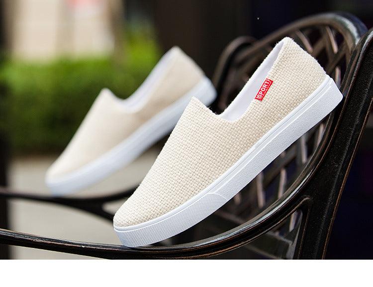 Stevvex casual canvas sneakers pair slip-on in off-white fabric with white sole and tag on Tampa Home & Garden Store