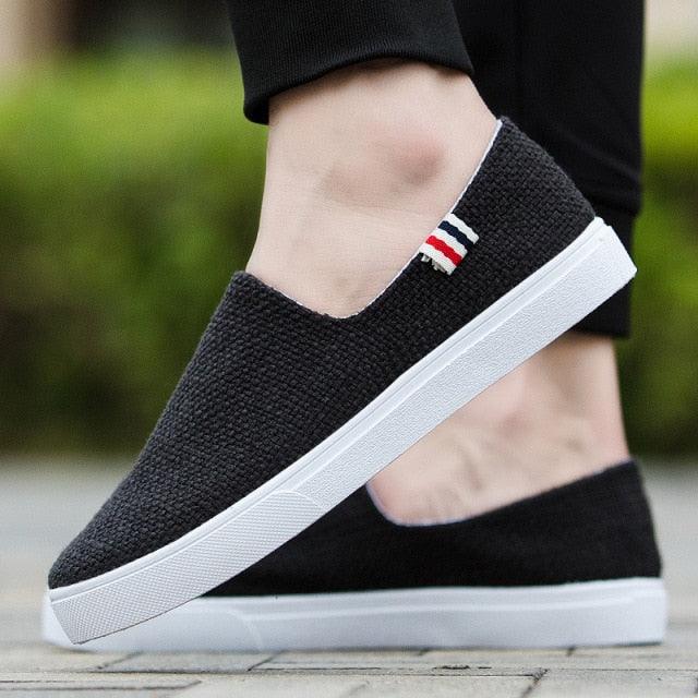 Stevvex black canvas slip-on sneakers with white rubber sole casual walking shoes on Tampa Home & Garden Store