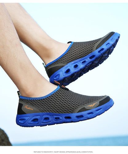 Mens aqua mesh water sneakers by Stevvex with breathable black upper and blue outsole on Tampa Home & Garden Store