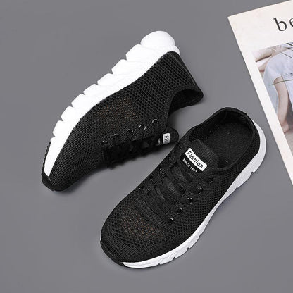 Stevvex women's black mesh sneakers pair, breathable walking shoes with white sole on Tampa Home & Garden Store