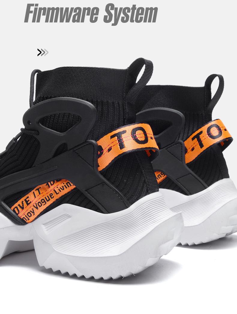 Stevvex men's sneakers pair with black mesh, orange straps and chunky white sole on Tampa Home & Garden Store