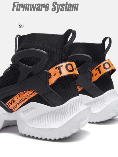 Stevvex men's sneakers pair with black mesh, orange straps and chunky white sole on Tampa Home & Garden Store