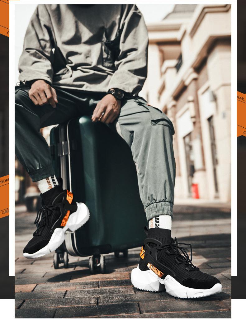 Men's sneakers Stevvex black mesh with orange accents, chunky white sole, non-slip walking on Tampa Home & Garden Store