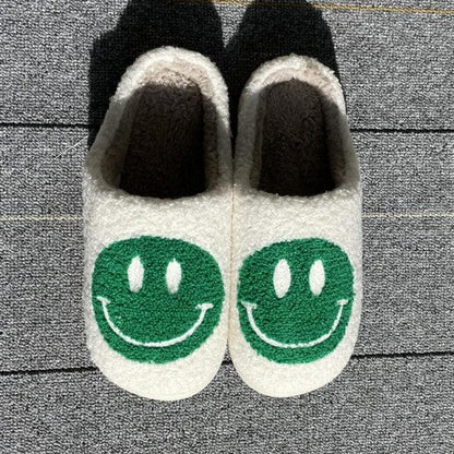 Stevvex white plush slippers with green smiley faces, fluffy lining, indoor slip-ons pair on Tampa Home & Garden Store