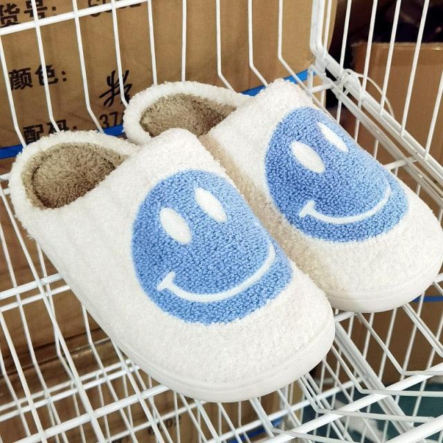 Slippers Stevvex white plush smiley face pair with blue smiley emblem, fluffy interior on Tampa Home & Garden Store